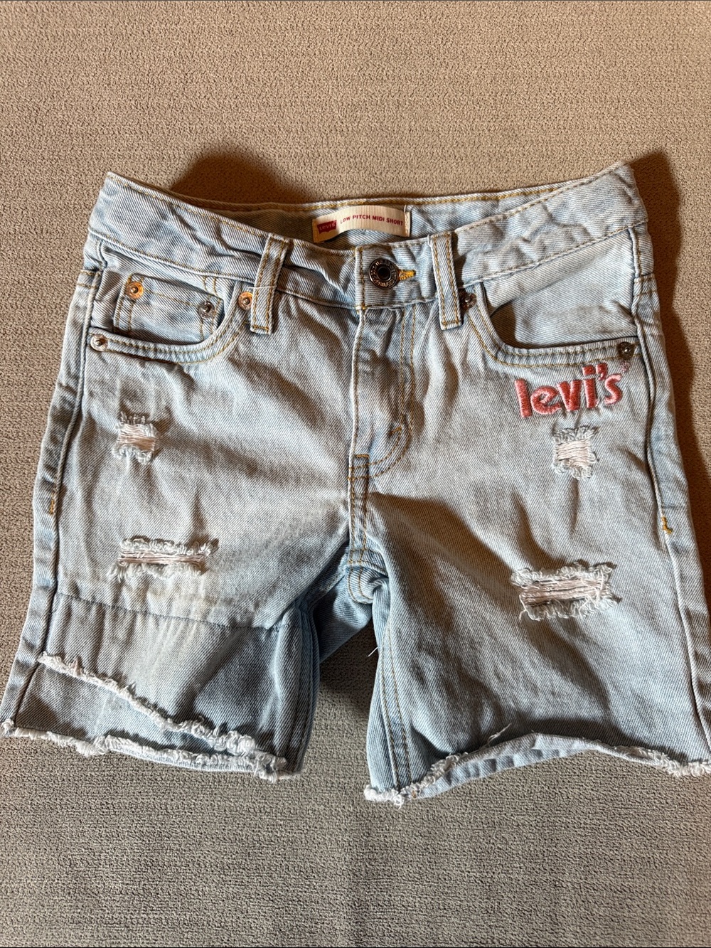 Levi's Light Blue Distressed Denim Shorts with Pink Logo
